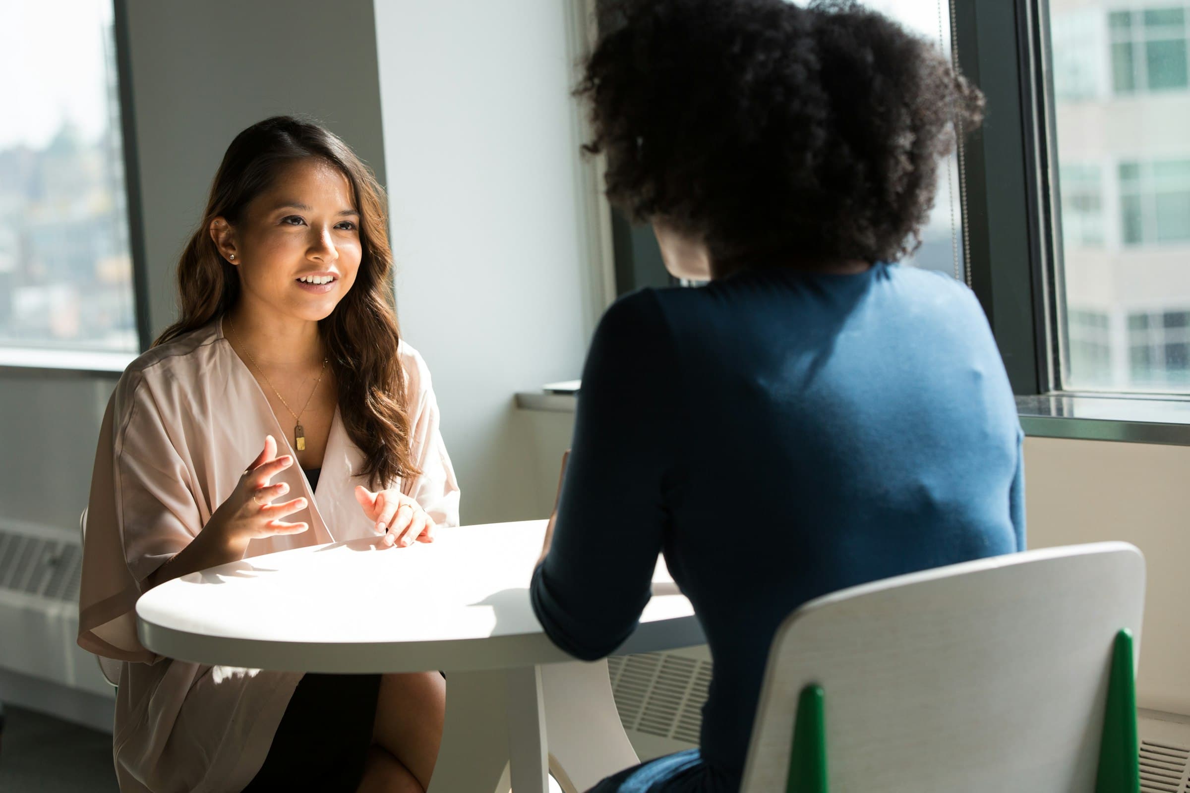 In-person meeting where an on-site interpreter supports clear communication