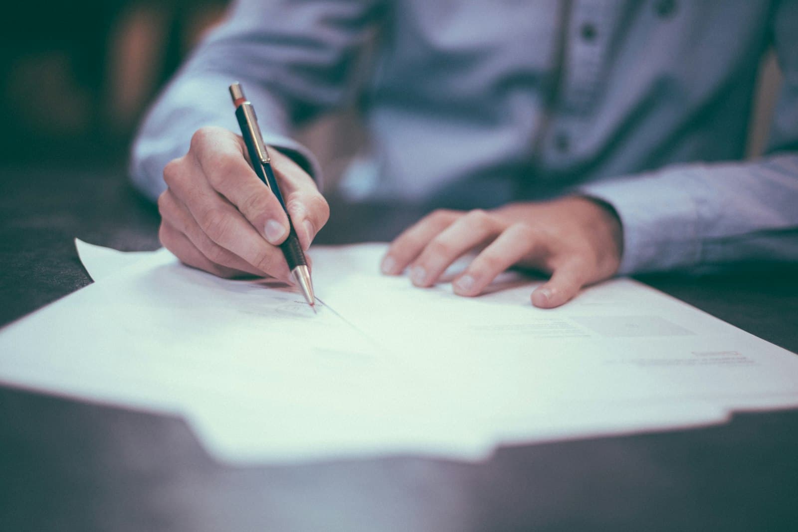 Professional reviewing contracts and documents for written translation