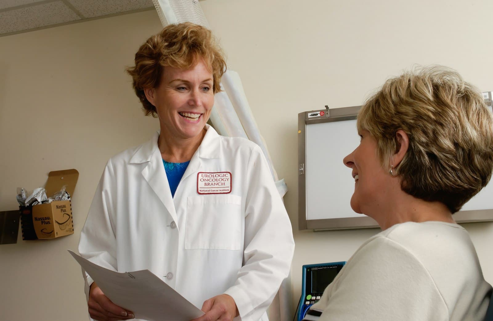 Doctor reviewing patient notes in a specialty care setting